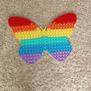 A butterfly rainbow pop it